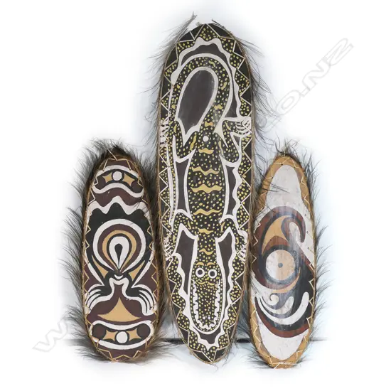 Three Gogodala PNG canoe ornaments,