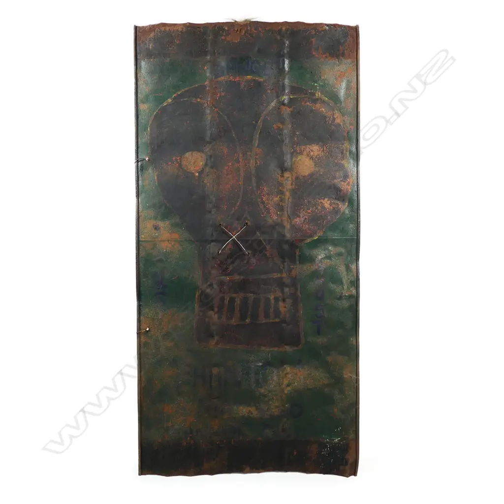 A Phantom metal shield with painted skull, Image 1++