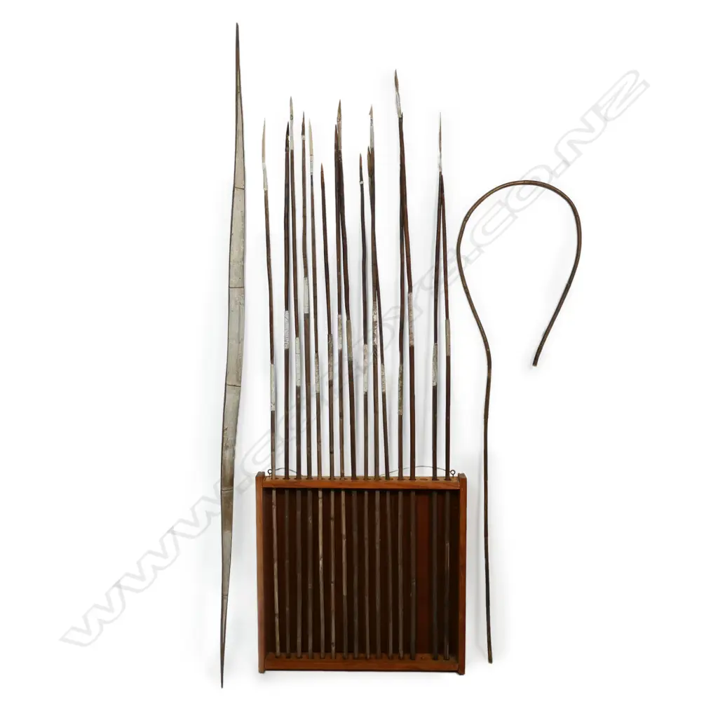 A collection of fifteen spears plus bow and 'man catcher' hoop with stand, Image 1++