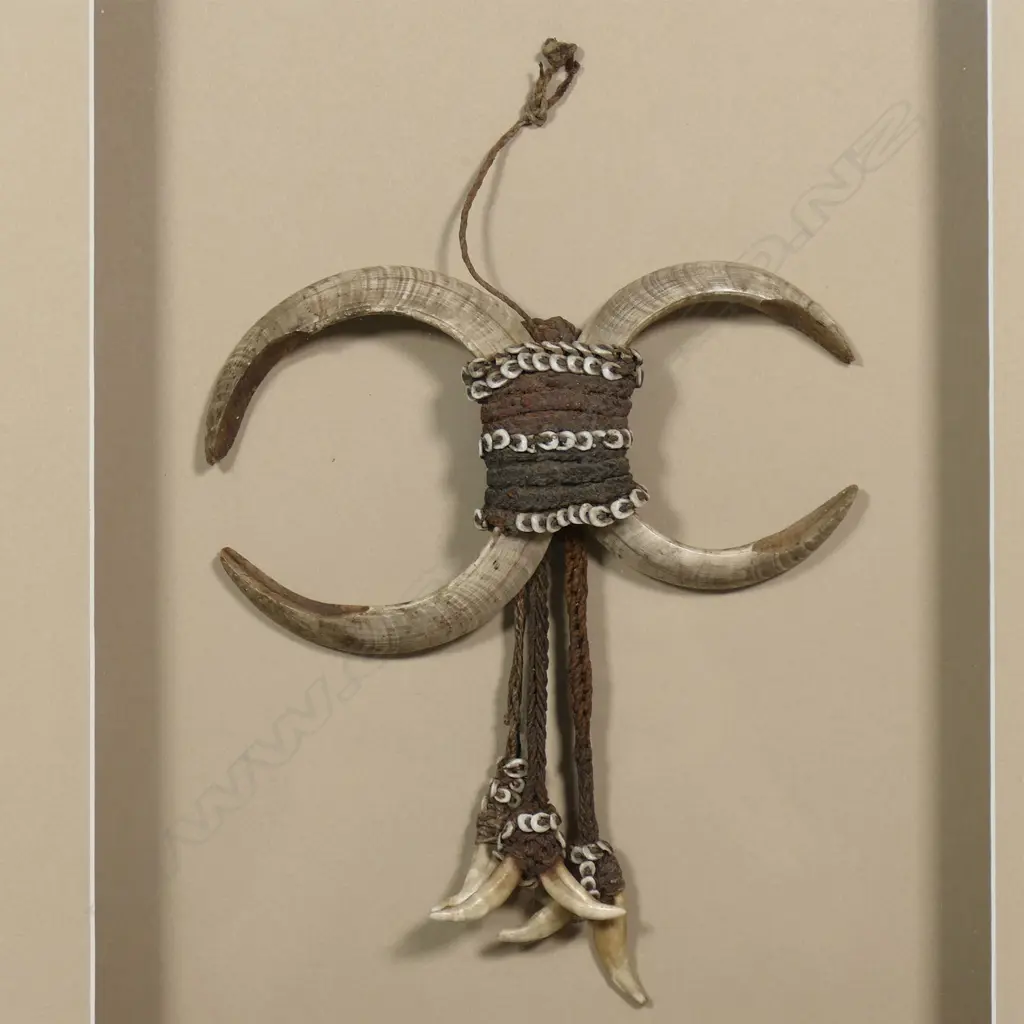 A PNG breast ornament made of boar's tusks and strings of dog's teeth, Image 1++