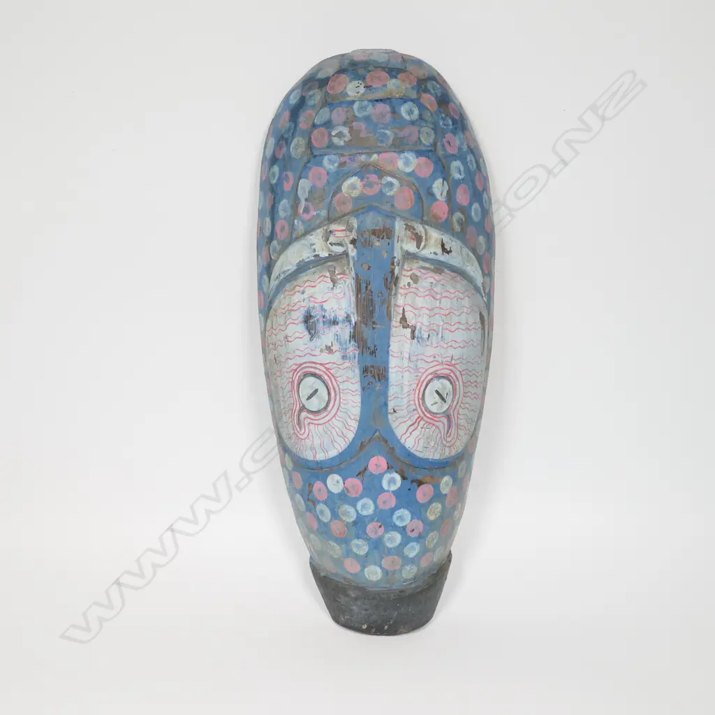 An African carved and painted wooden mask, Image 1++