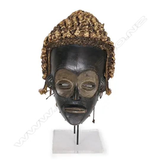 A Cameroon Chokwe mask on stand,
