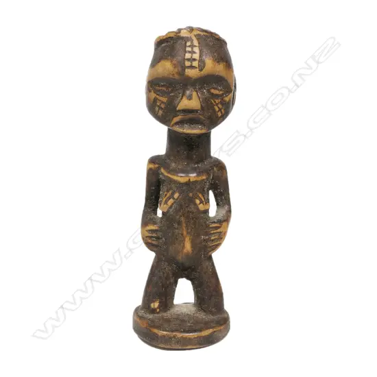 A Namibian Tabwa People small wooden bushman figure on stand,