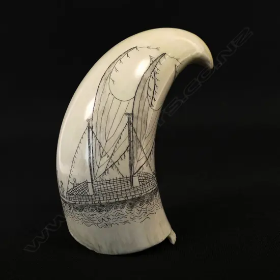 A contemporary scrimshaw whale tooth