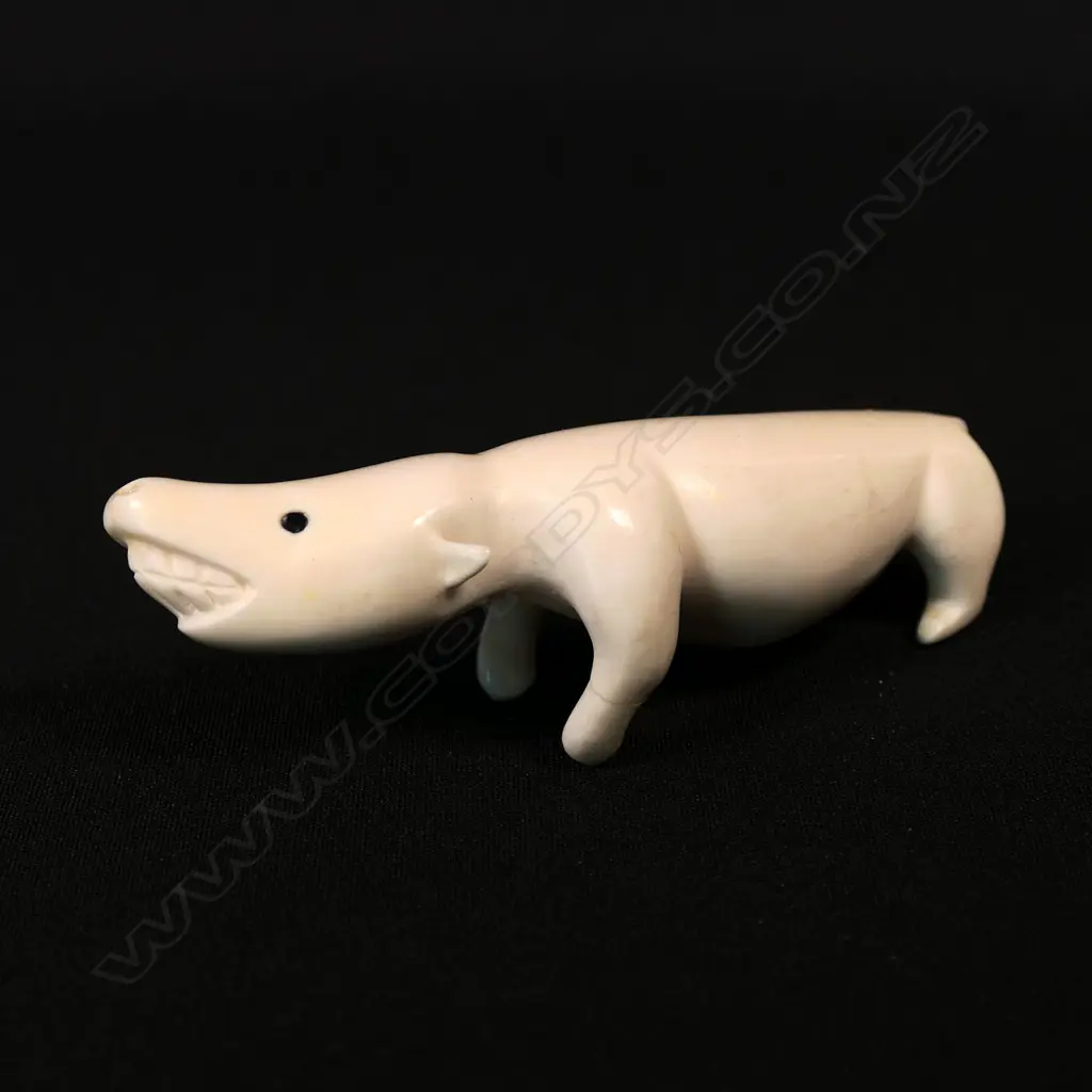 An Inuit culture marine ivory carving of a dog Image 1++