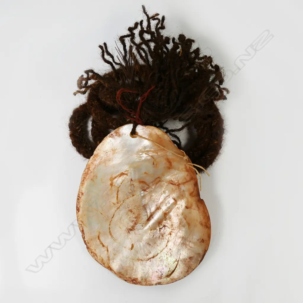 An Australian Aboriginal pearl shell lonka lonka (pubic cover) Image 1++