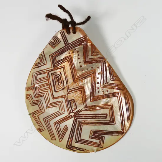 An Australian Aboriginal pearl shell lonka lonka / riji (pubic cover)