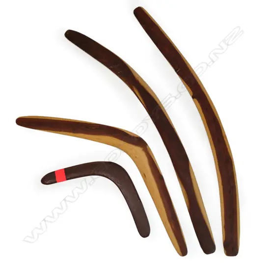 Three mulga wood boomerangs and another smaller
