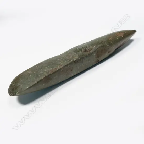 A West Papuan grey-green stone adze blade