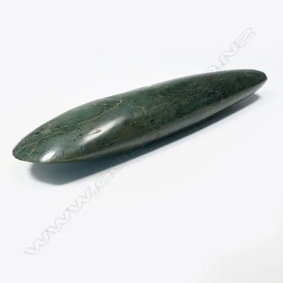 A polished stone bride price celt / wealth object