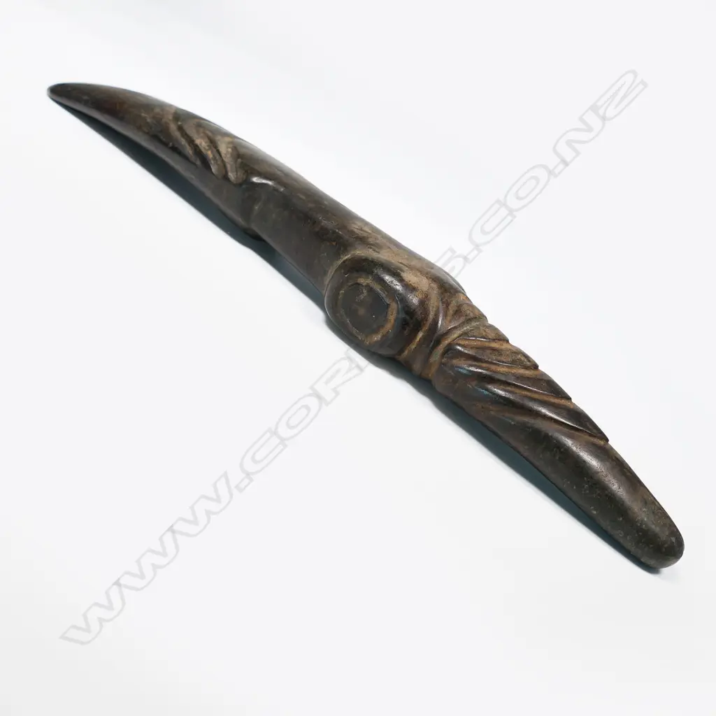 A large and decorative ceremonial adze blade Image 1++