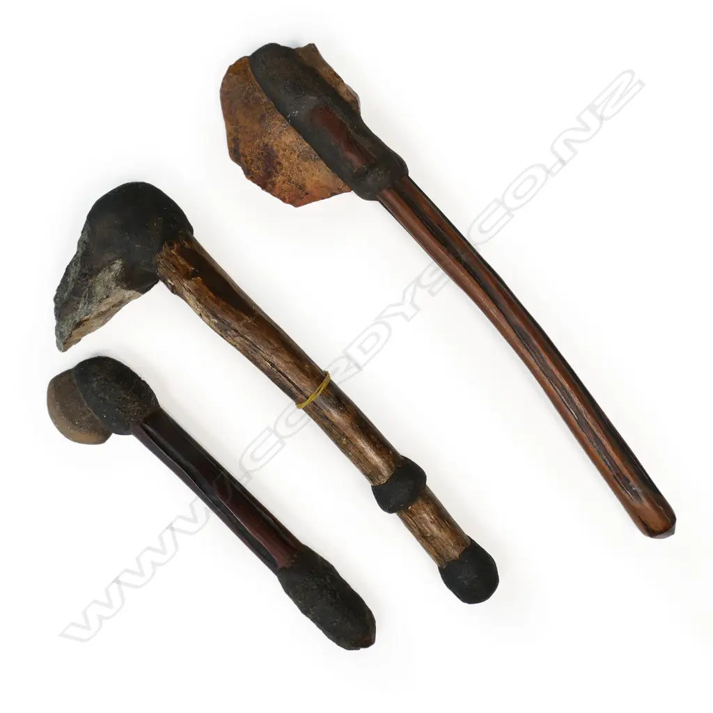 An Aboriginal stone fighting pick and two stone headed axes Image 1++
