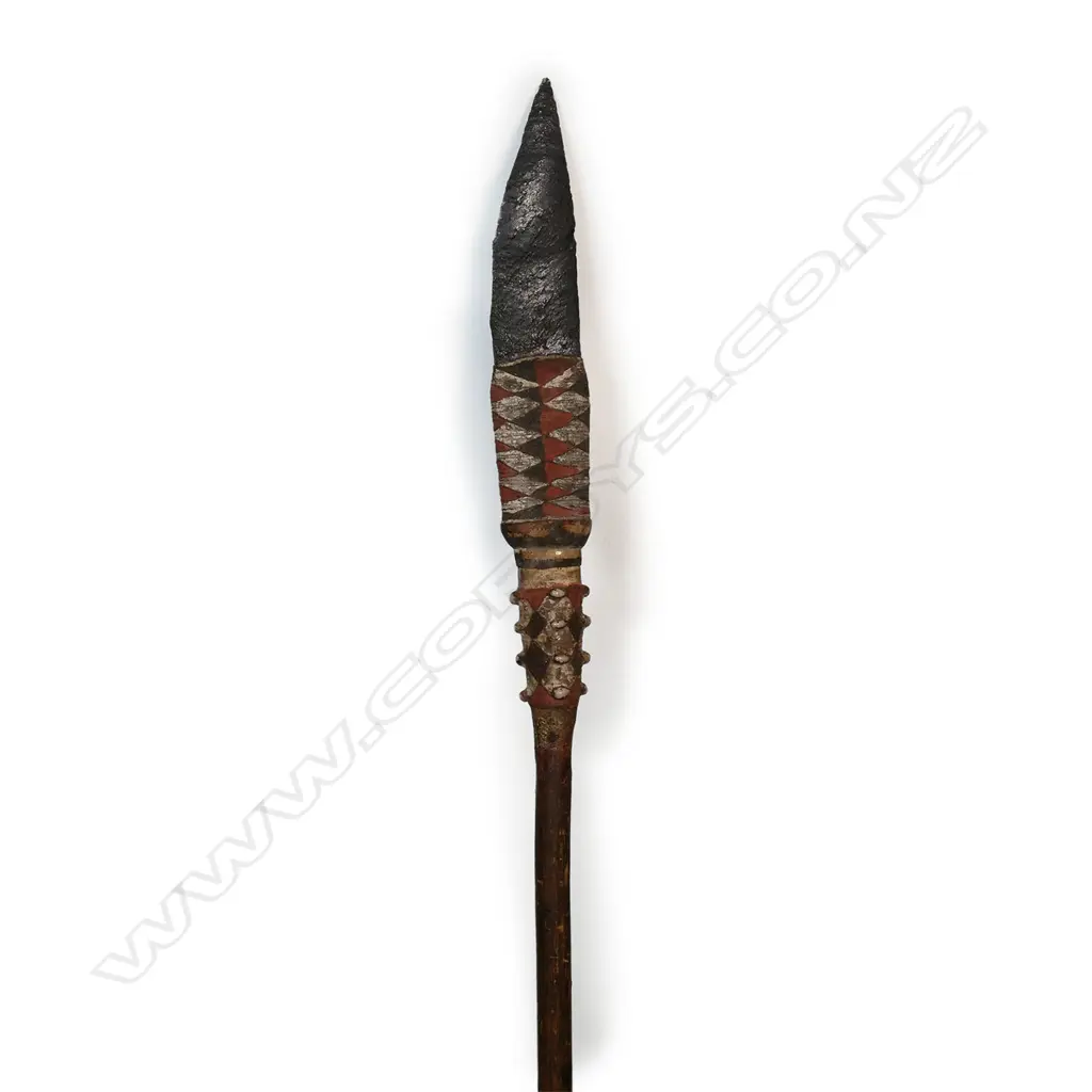 A very good obsidian bladed spear, Bismarck Archipelago, Admiralty Islands, PNG. Late 19thC. Fine large flaked point fixed with parinarium nut paste and bound with fine cord mount with tri-colour ochre decoration and similar shoulder additionally with coix seeds, fitted to a slender tapering shaft. L.1610mm. Provenance: Mann Family Collection, Leipzig, Germany; Zemanek-Munster Wurzburg Auctions Sept 17, 2011; Tribal Art Kortmann 2012. The Jorgen Lotz Collection. Image 1++