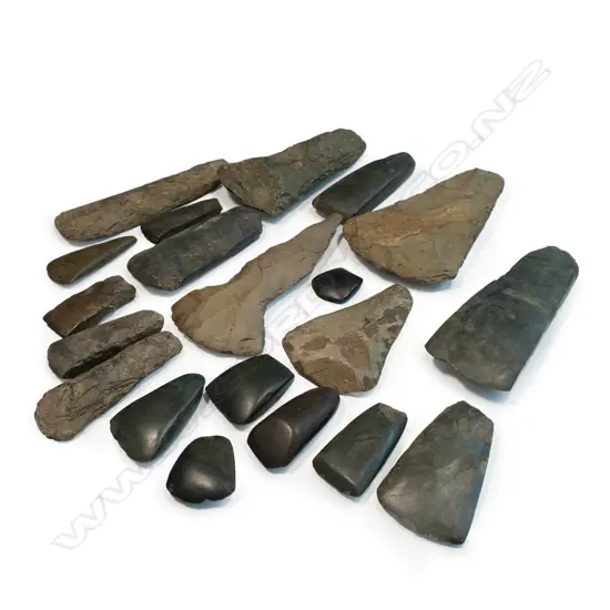 A collection of twenty various stone adze blades