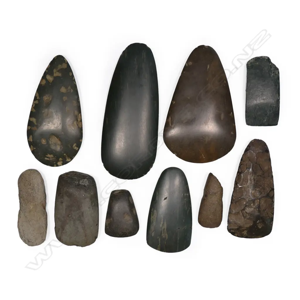 A collection of ten various stone adze blades Image 1++