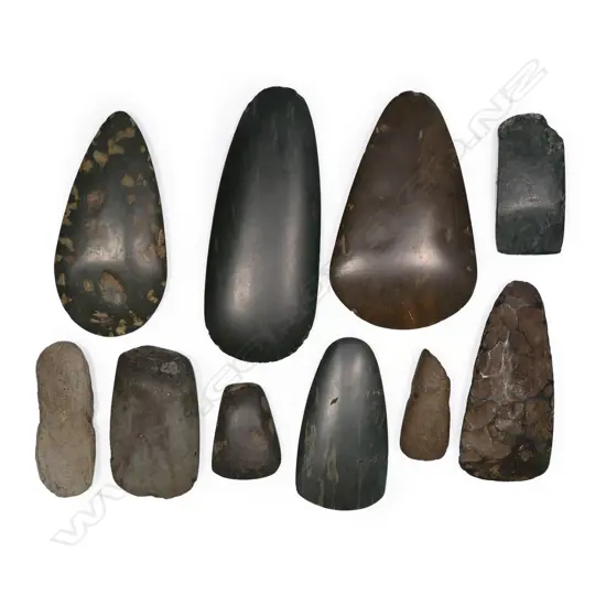 A collection of ten various stone adze blades