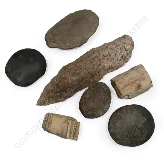 A large Aboriginal conglomerate stone fighting pick and three flaked stone hand axes