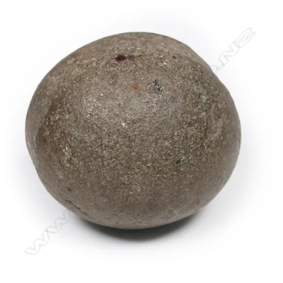 An old stone tooled Māori mahe (sinker)