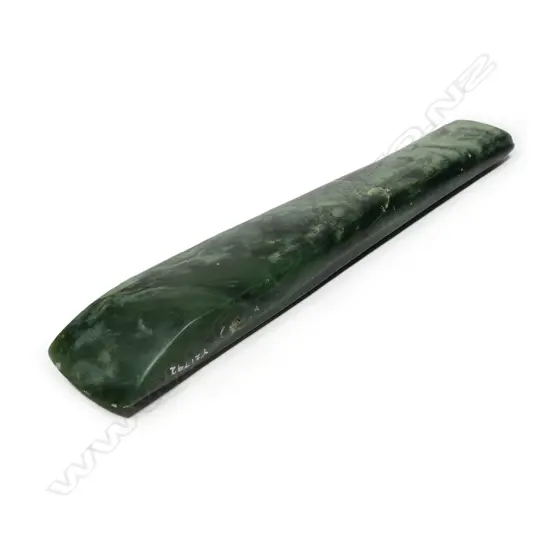 A large old Māori toki pounamu (adze)