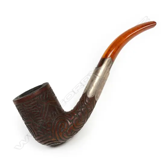 An early 20thC Māori carved pipe