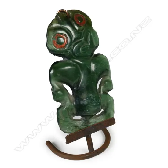 A 19thC Māori carved pounamu (Bowenite) hei tiki