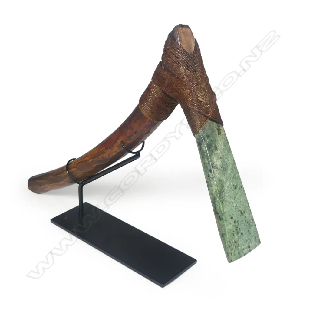 A tribal pounamu and carved wood hafted adze Image 1++