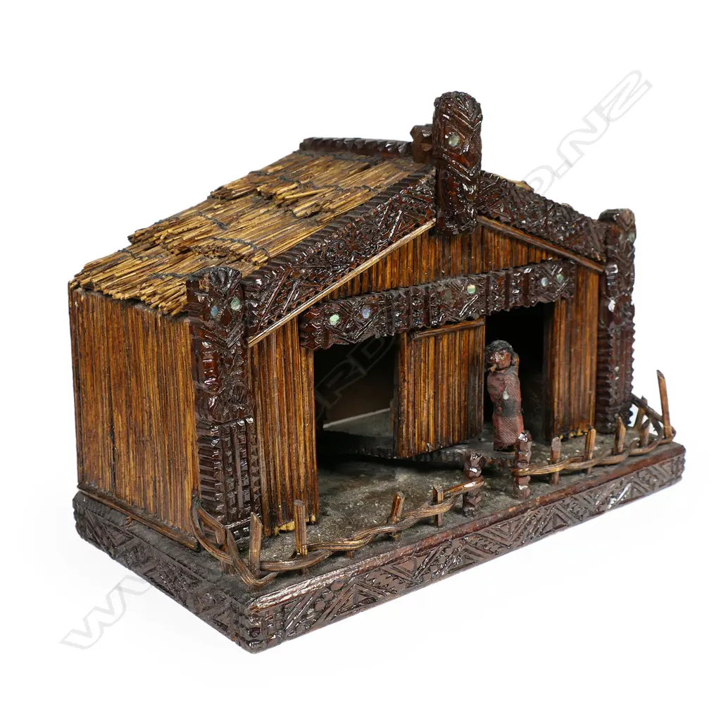 An early 20thC carved and constructed Māori model whare weather indicator Image 1++