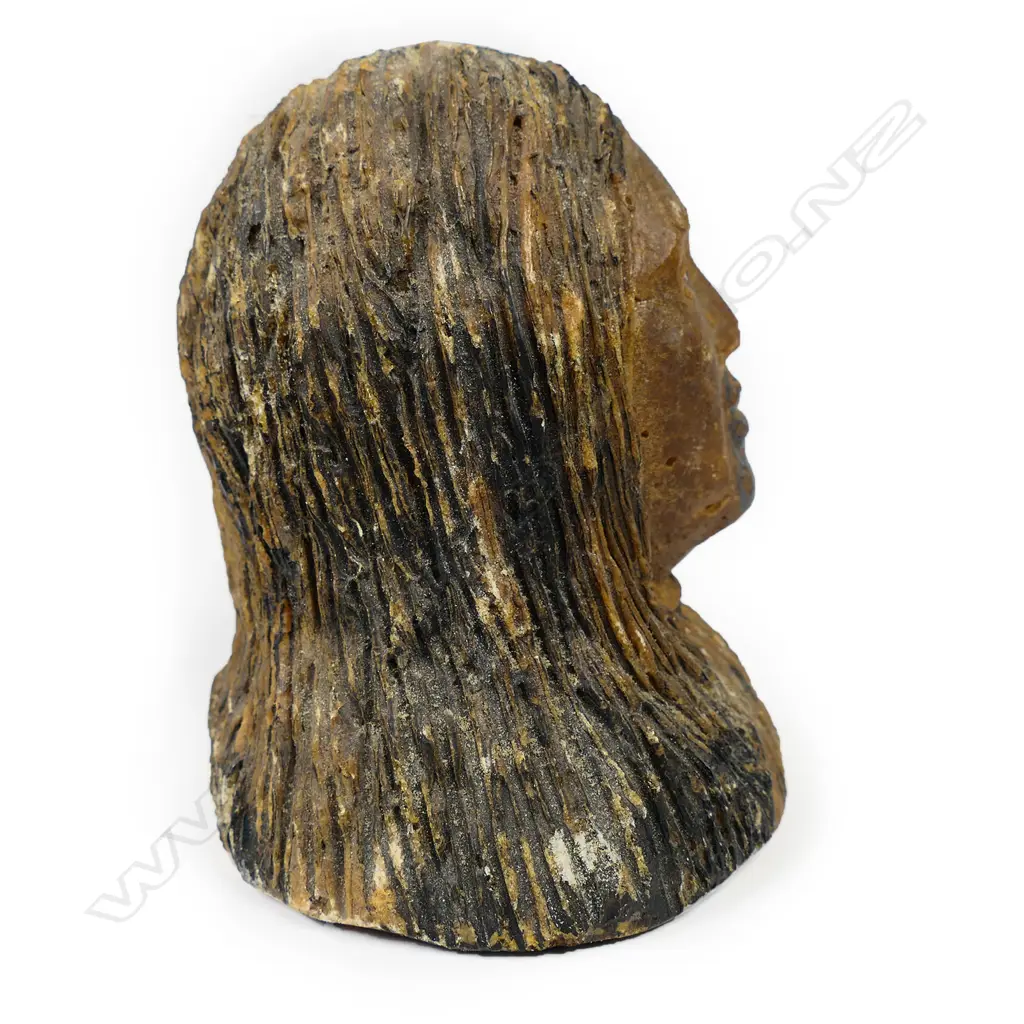 A carved kauri gum Māori portrait bust of a woman Image 1++