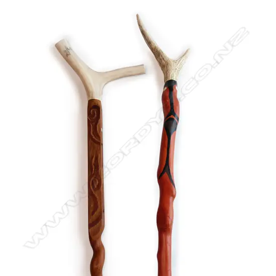 Two tribal walking sticks
