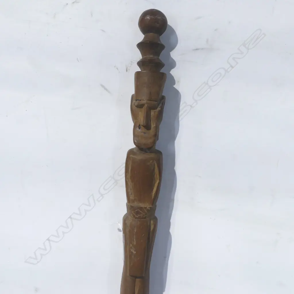 A wood carved tribal staff Image 1++