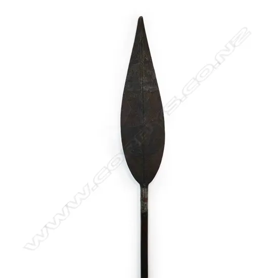 An old Trobriand Islands long paddle with carved and painted detail