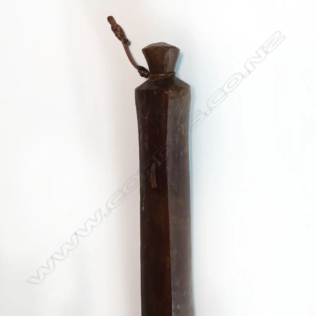 A Tongan club with head of tapering diamond section Image 1++