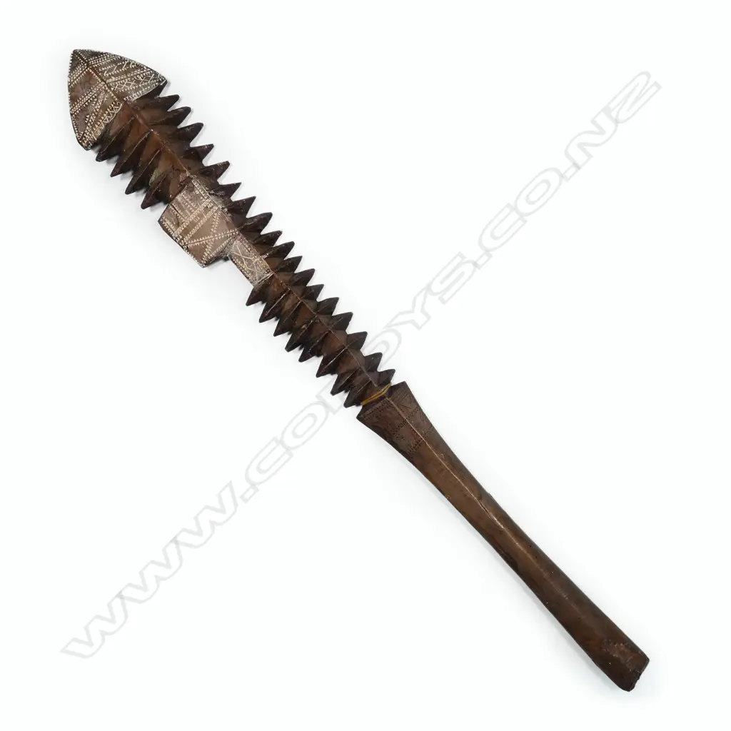 An old Samoan carved wood club Image 1++