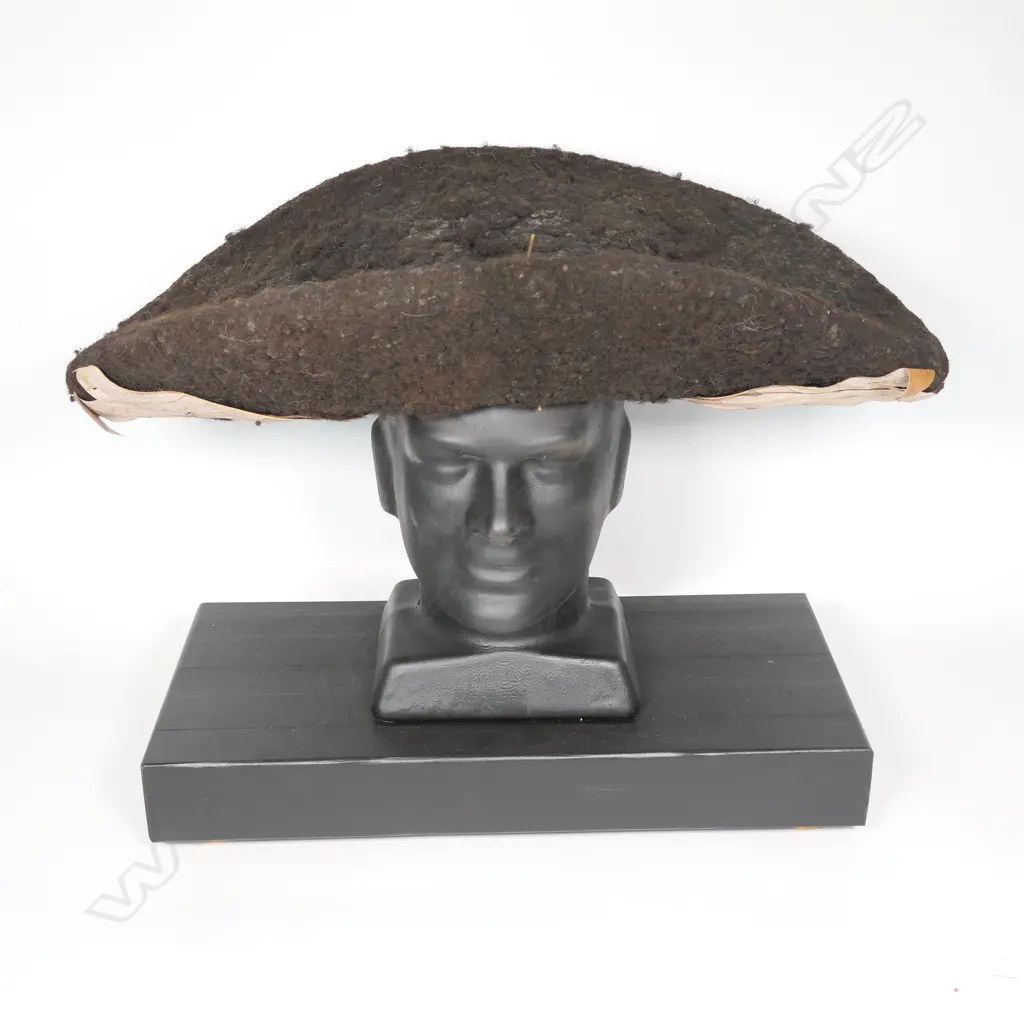 A human hair wig with dried leaf decoration Image 1++