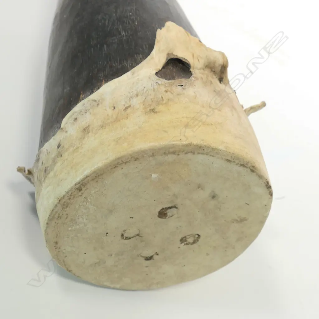 A vintage carved wood kundu drum from PNG Image 1++