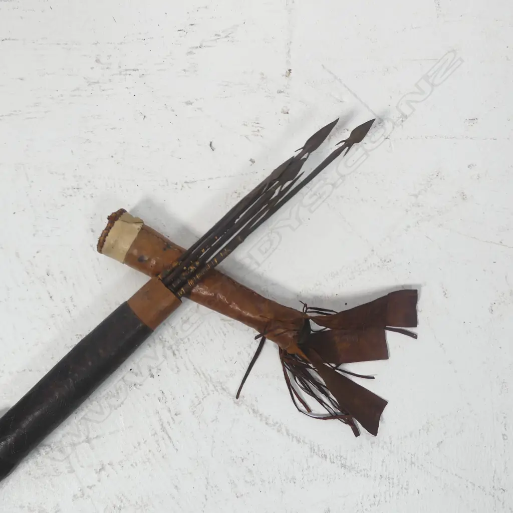 An old and finely tooled leather and bamboo quiver Image 1++