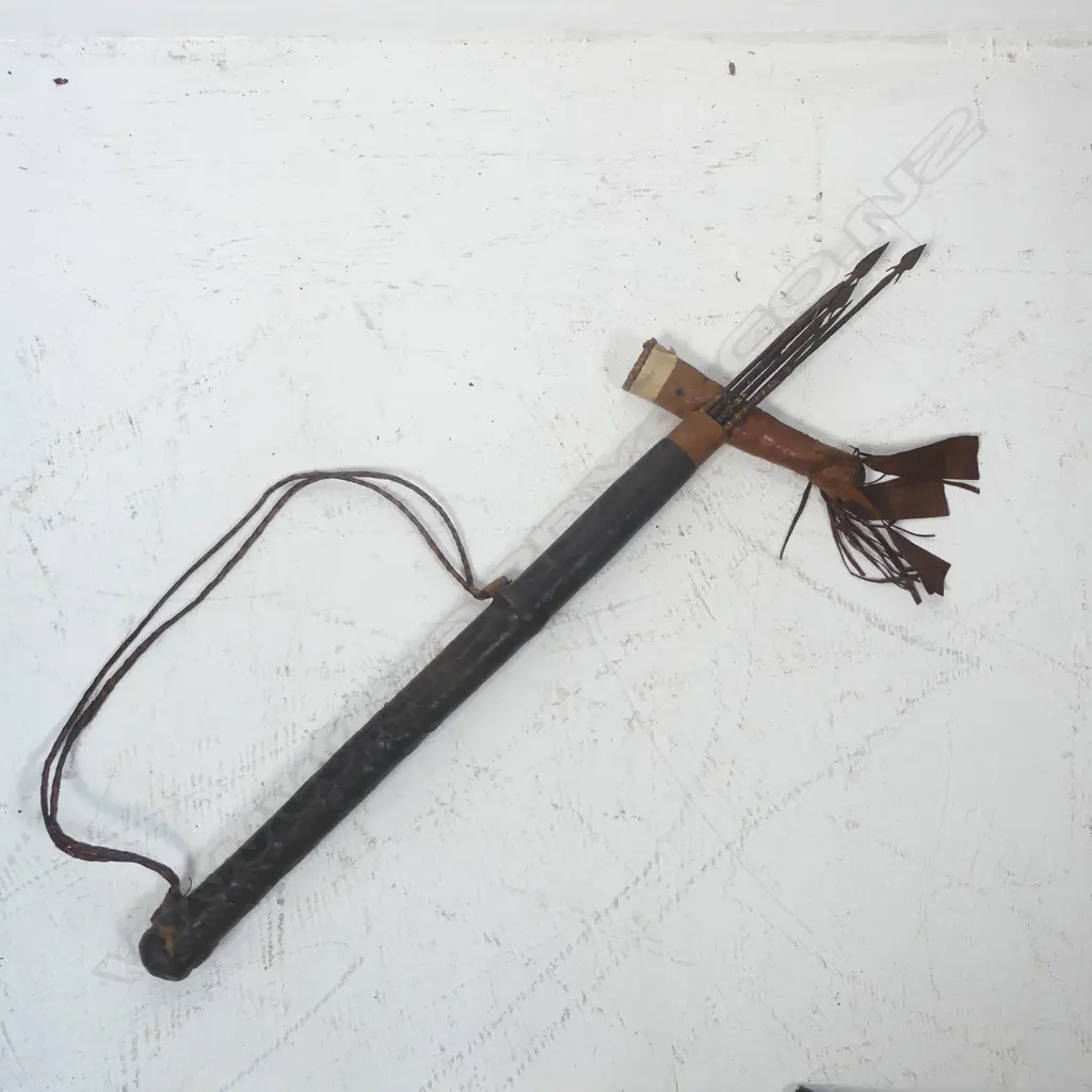 An old and finely tooled leather and bamboo quiver Image 1++