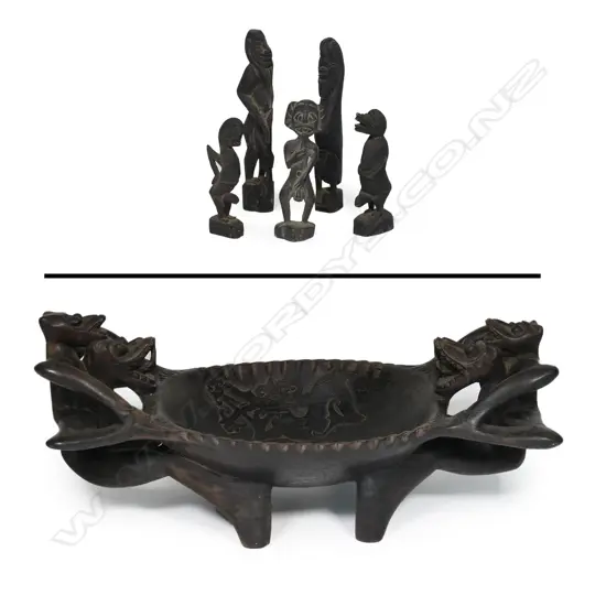 An Indonesian figure supported large wooden bowl with five small tribal figures
