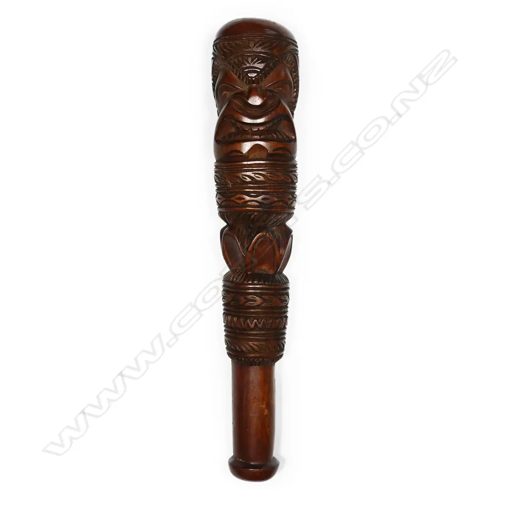 A 20thC Hawaii large carved hardwood hand club Image 1++