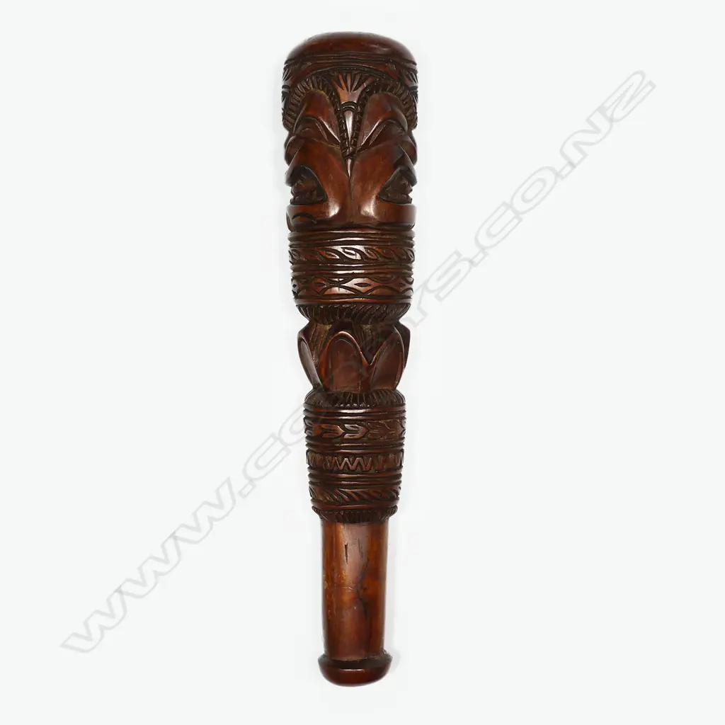 A 20thC Hawaii large carved hardwood hand club Image 1++