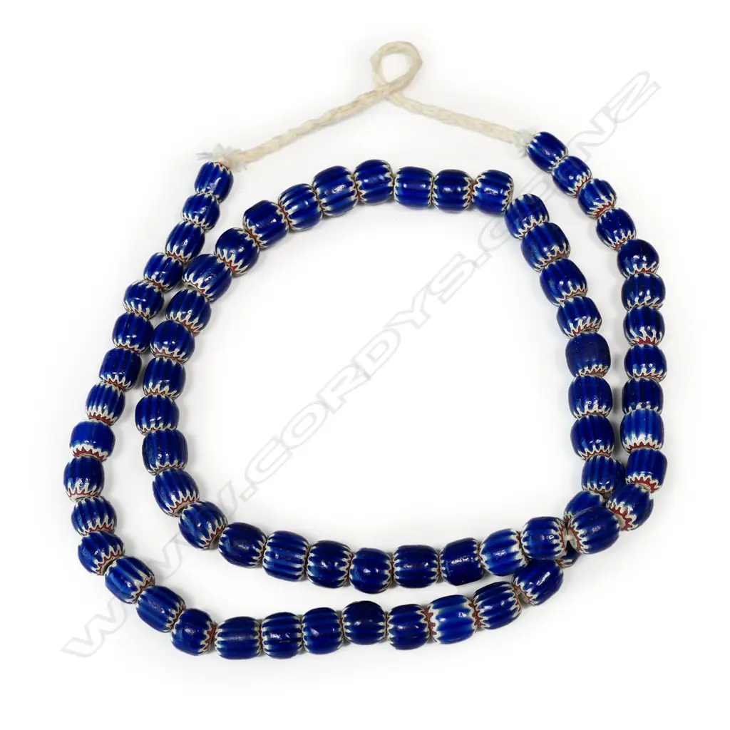 A long strand of coloured glass trade beads Image 1++