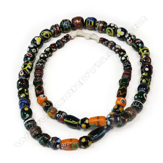 A long strand of coloured glass trade beads