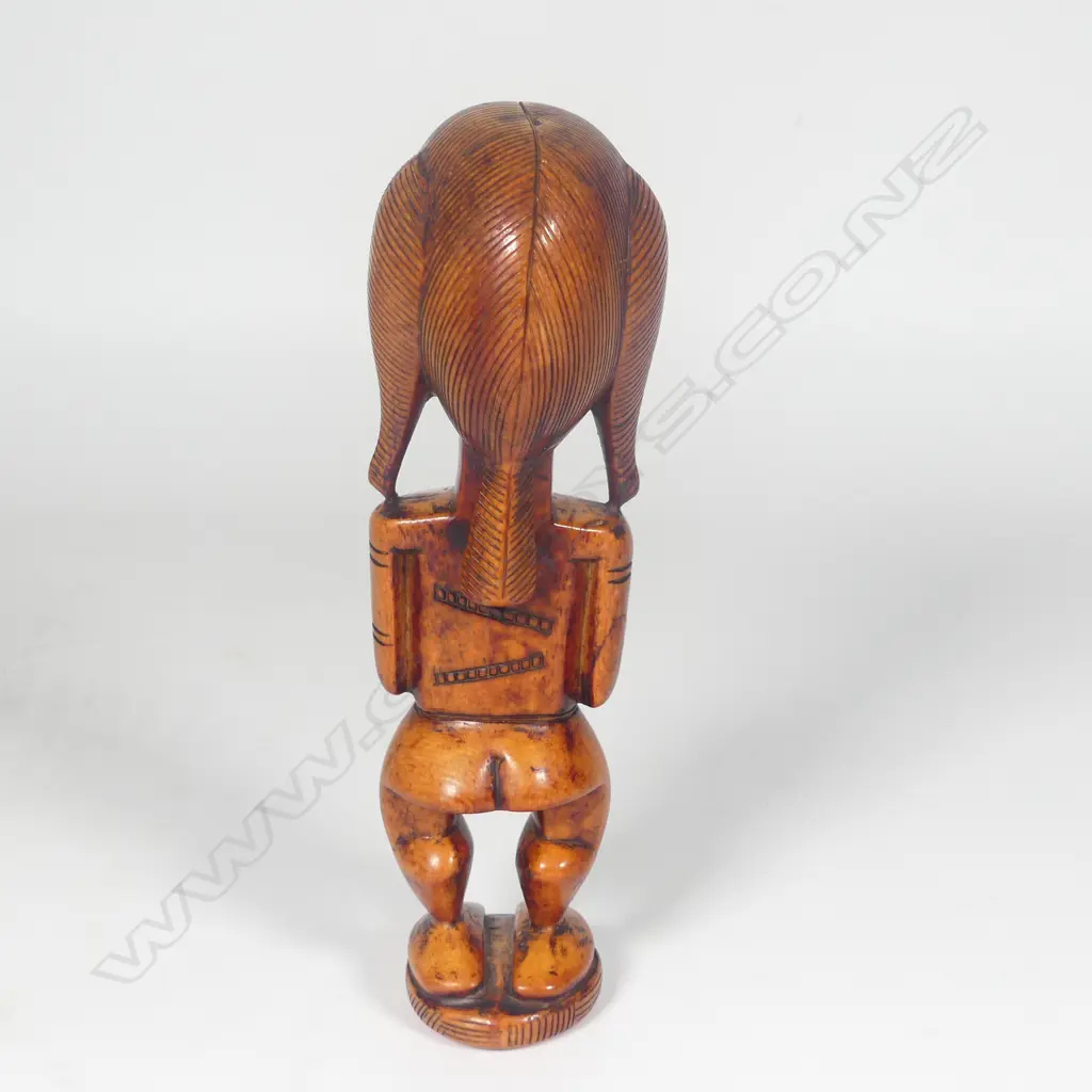 A Yoruba Benin Ere Ibeji solid ivory carved female figure Image 1++