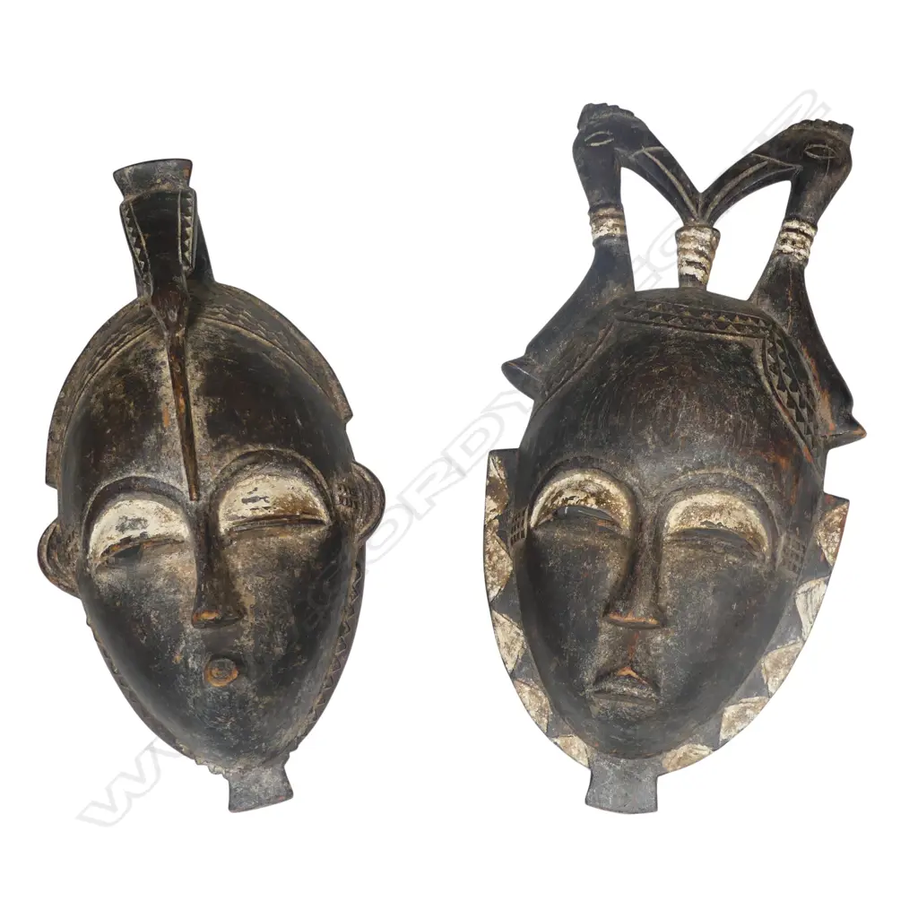 Two African Boule carved wood masks Image 1++