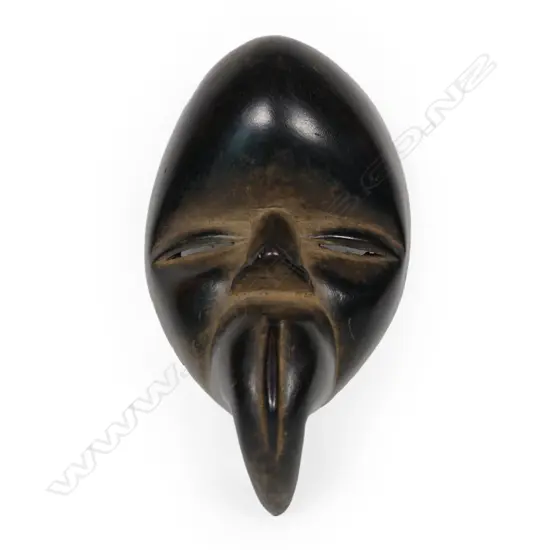 A carved Bird mask