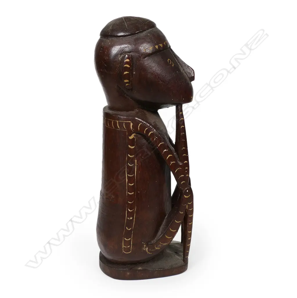 A carved tribal figure Image 1++