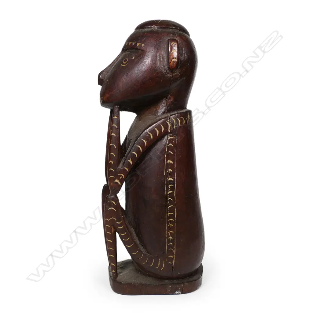 A carved tribal figure Image 1++