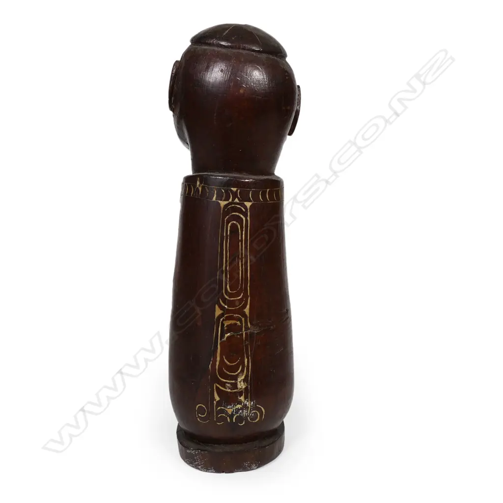 A carved tribal figure Image 1++