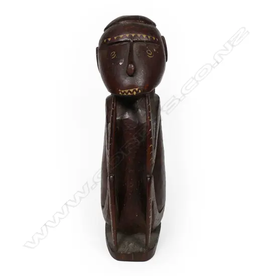 A carved tribal figure
