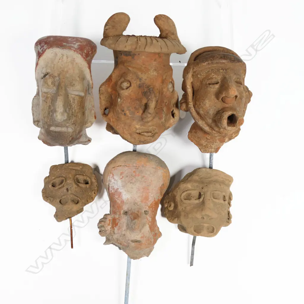 A Group of six Pre-Columbian Portrait Masks, Image 1++